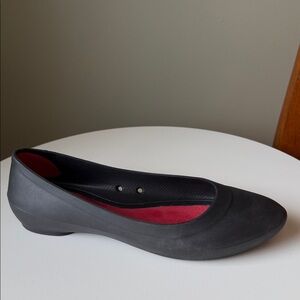 Crocs Lina black comfort ballet slip-on flats with a red insole